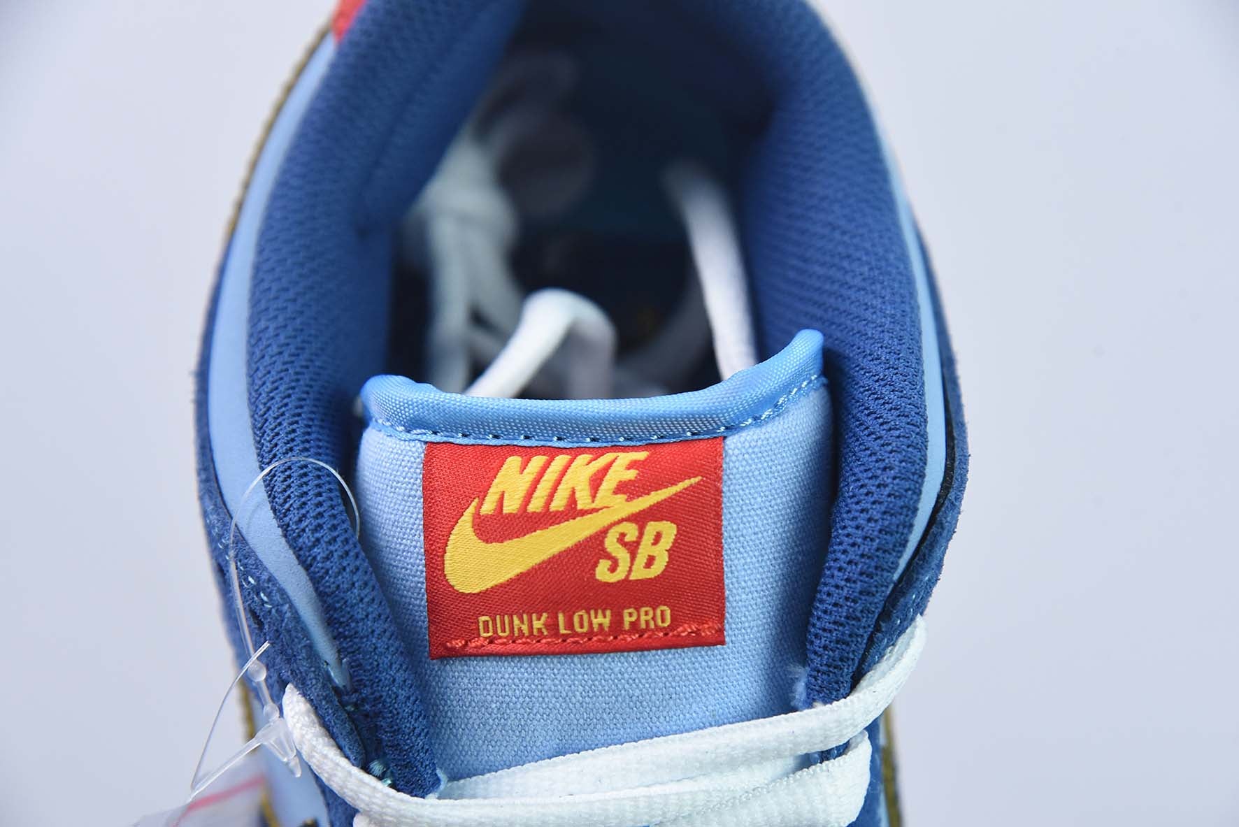 NIKE SB DUNK LOW PRM "WHY SO SAD" - DX5549-400