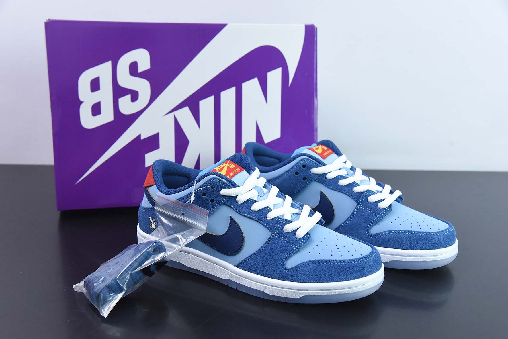 NIKE SB DUNK LOW PRM "WHY SO SAD" - DX5549-400